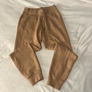Nike tan sweatpants, size medium